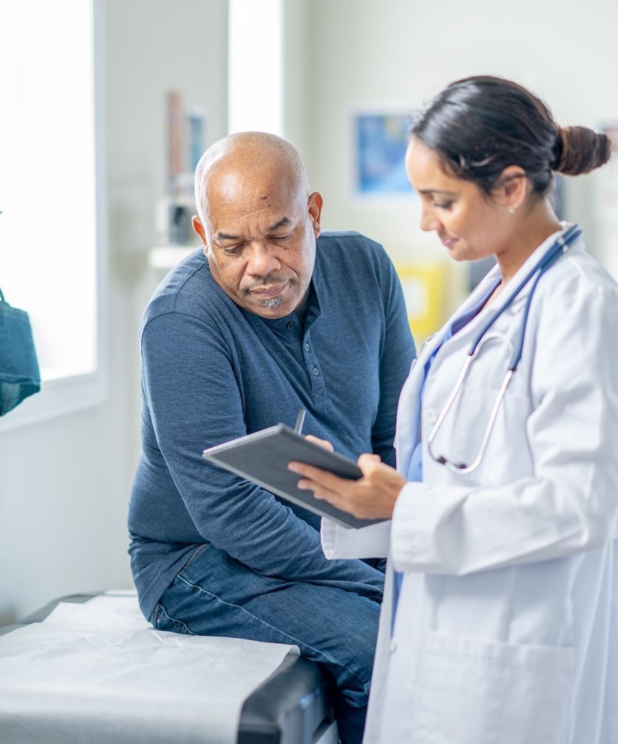 doctor helping patient